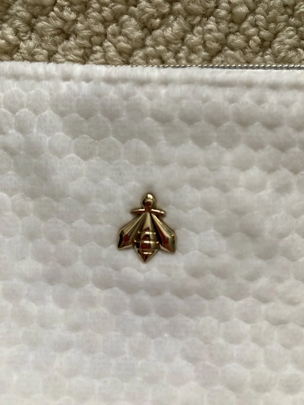 GUERLAIN White Cosmetic Pouch with Gold Bee Accent